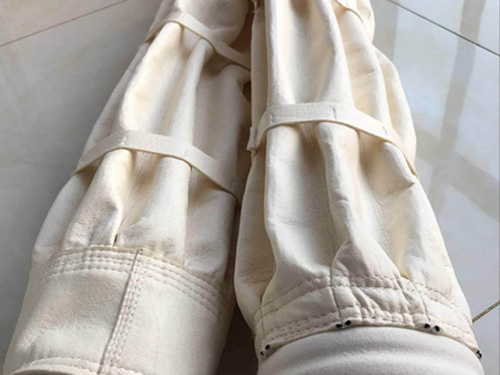 布袋除塵器滌綸布袋回灰閥門的改進(jìn)及過早失效原因